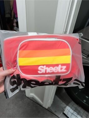 Sheetz Branded Red Stripe Fanny Pack.